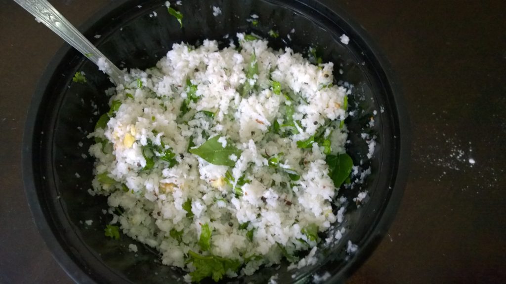Grated coconut mixed with chopped coriander, chopped curry leaves and ginger