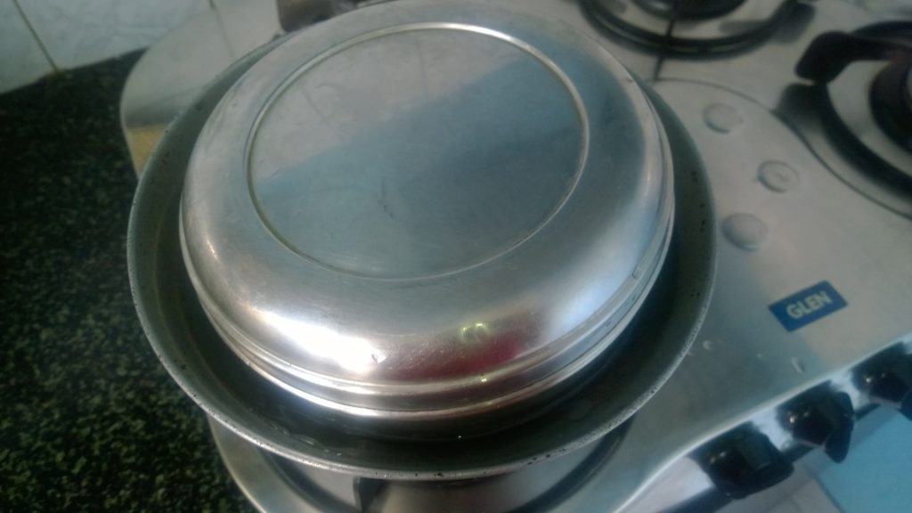 Prawn curry  prepared in steel tiffin box.