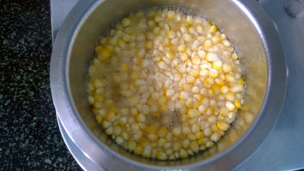 Corn kernels in boiling water