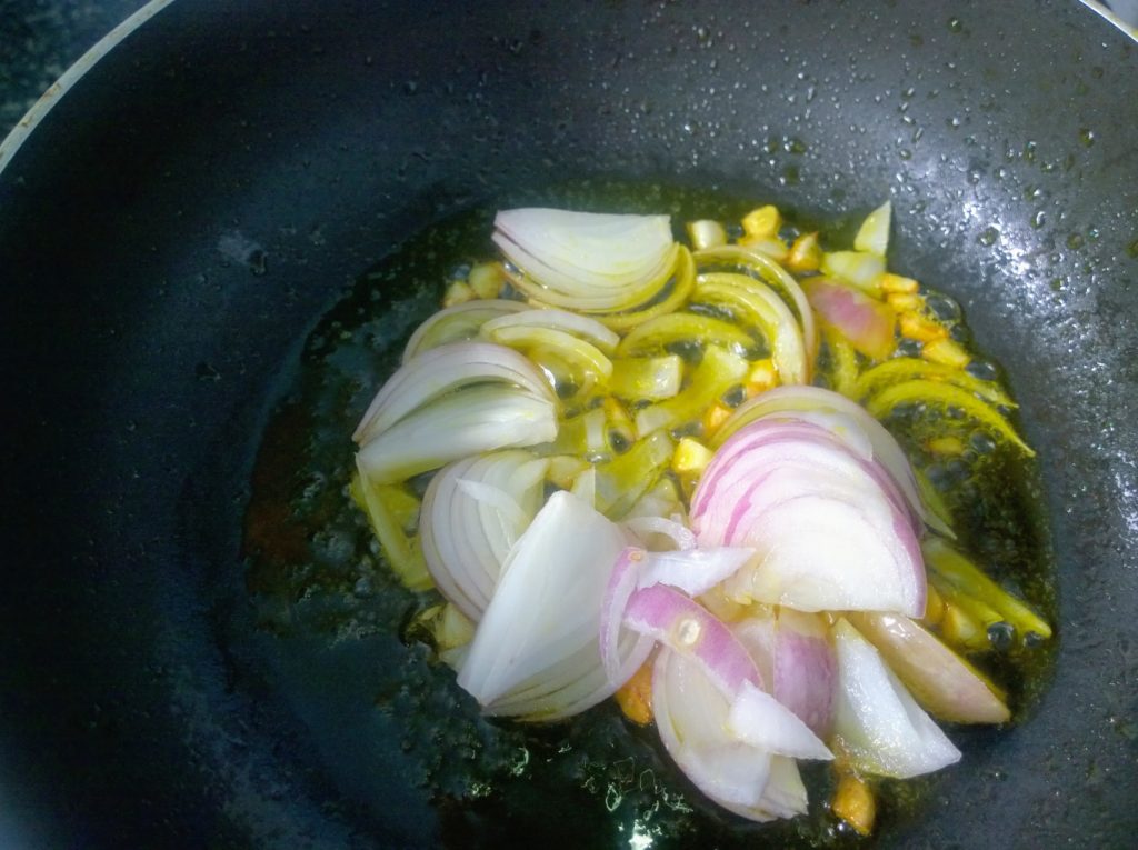 Onion and garlic in hot oil