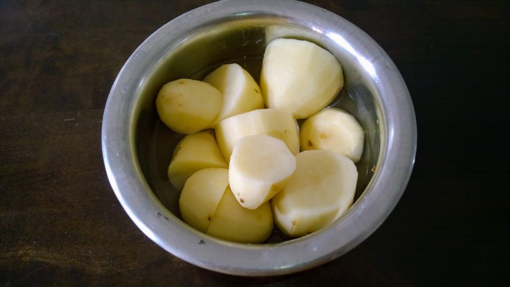 Potatoes cut into halves.