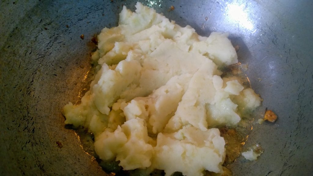 Mashed potato in hot oil.