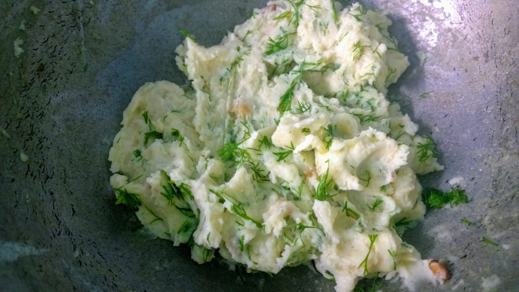 Dill leaves on mashed potato