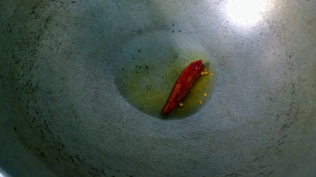 Red chilli tempering in hot oil
