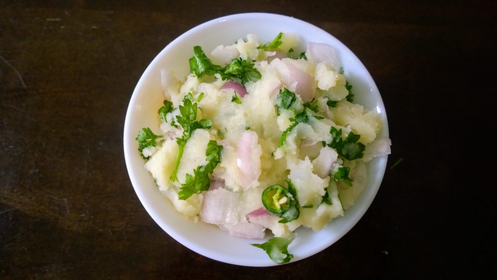 Mashed Potato with raw onion and coriander leaves