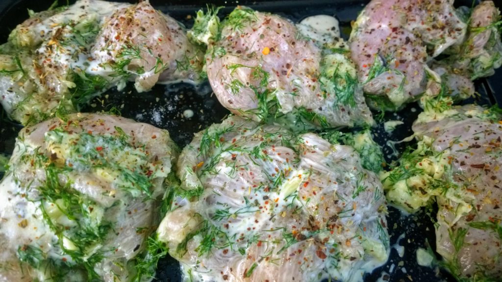 Chicken breast pieces dressed with herbs
