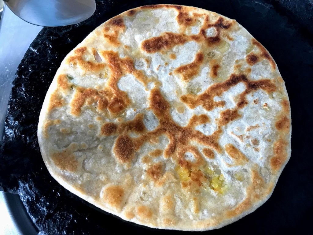 Chana Dal Paratha frying in tawa