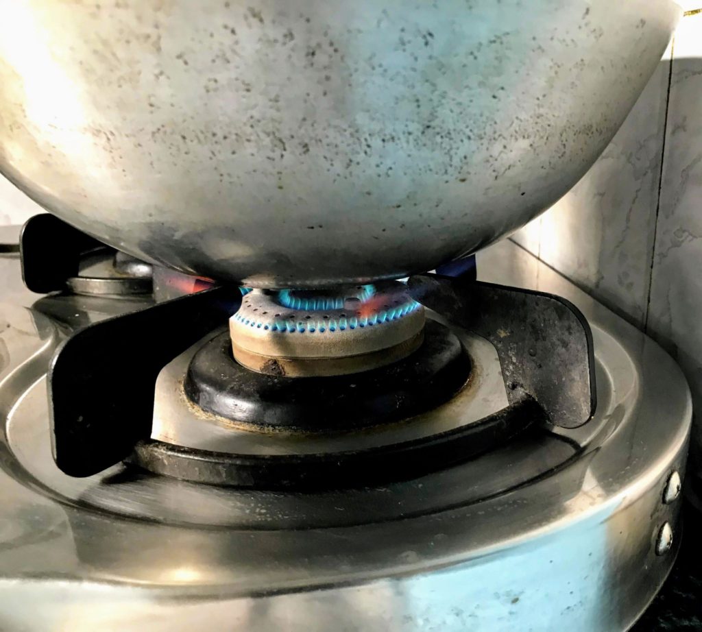 Heating pan on stove