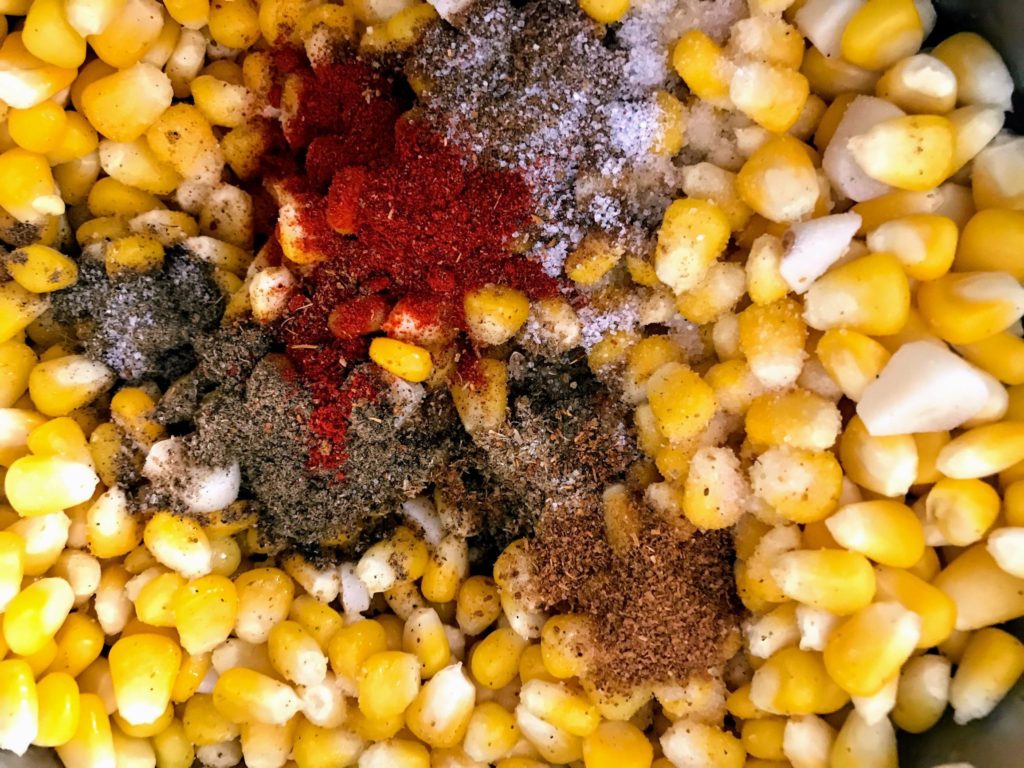 Spices added to corn kernels
