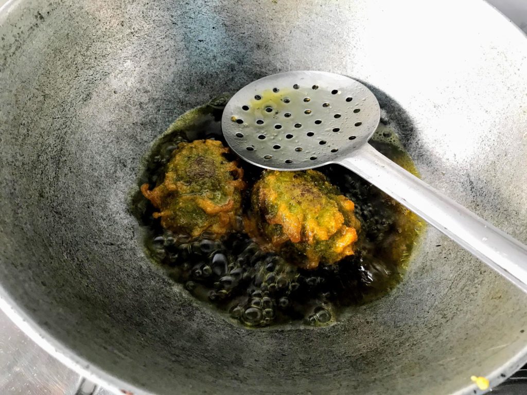 Deep frying Kakrol Pur Bhaja
