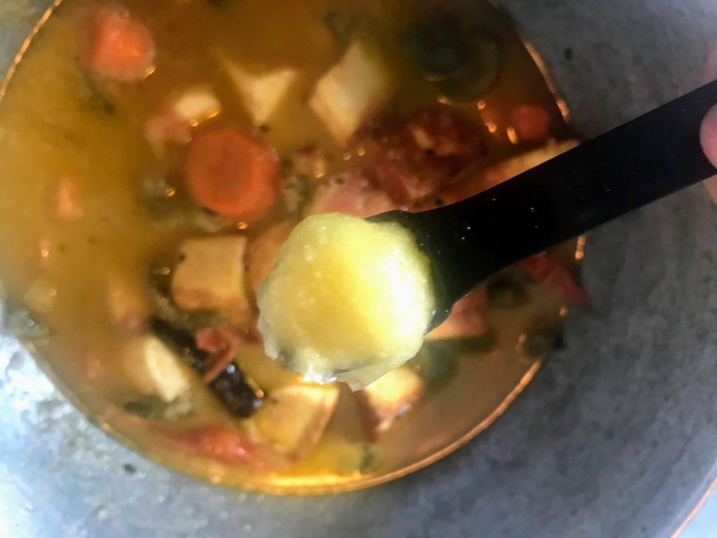 Adding ghee to a curry