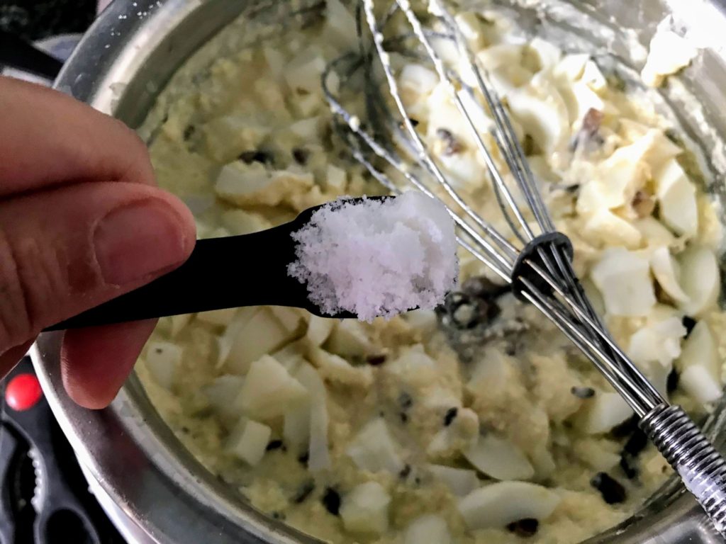 Salt into dish