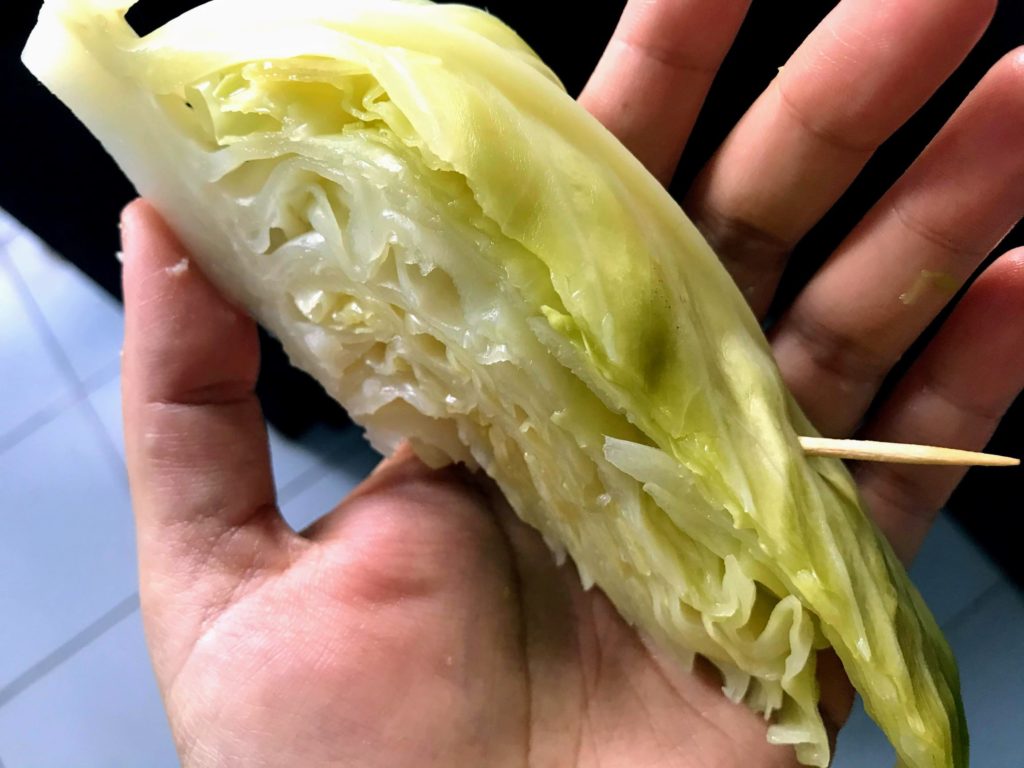 Tooth pick inserted into cabbage