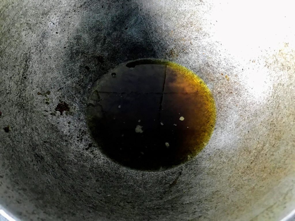 Mustard oil in a wok