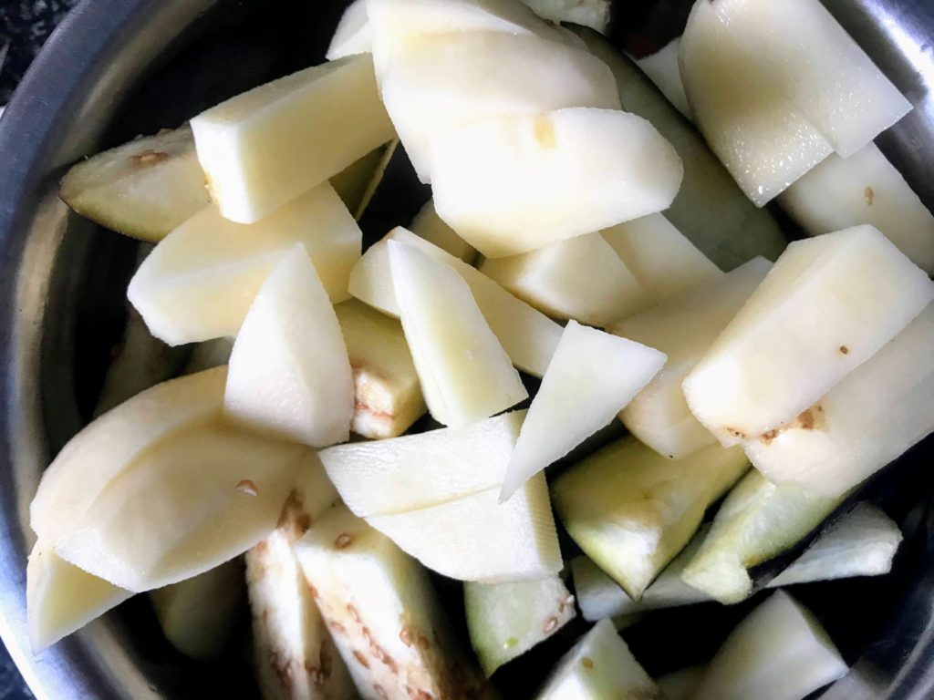 Cut brinjal and potato pieces