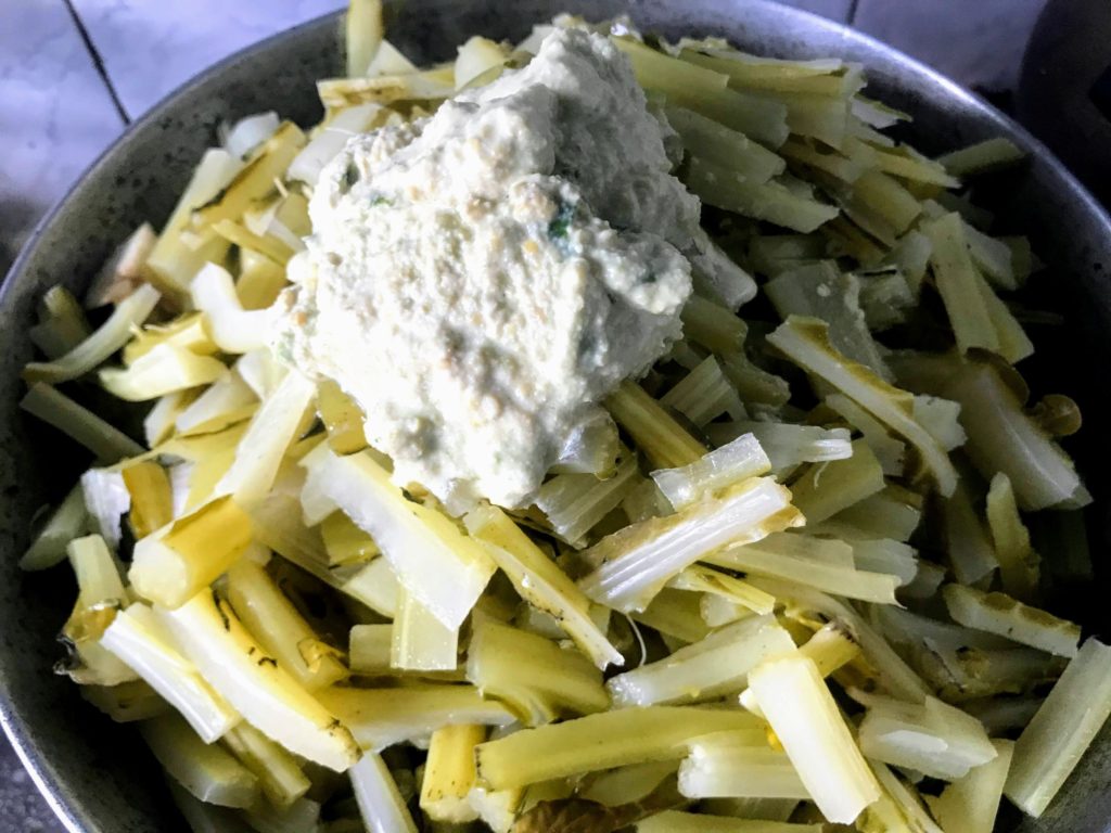 Mustard paste into vegetables