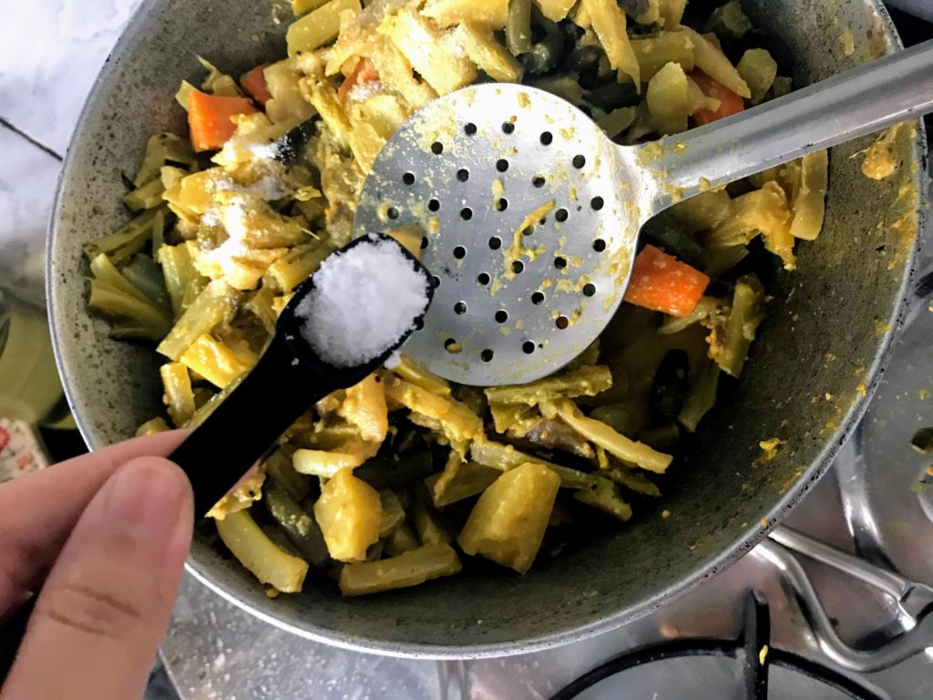 Adding salt while cooking