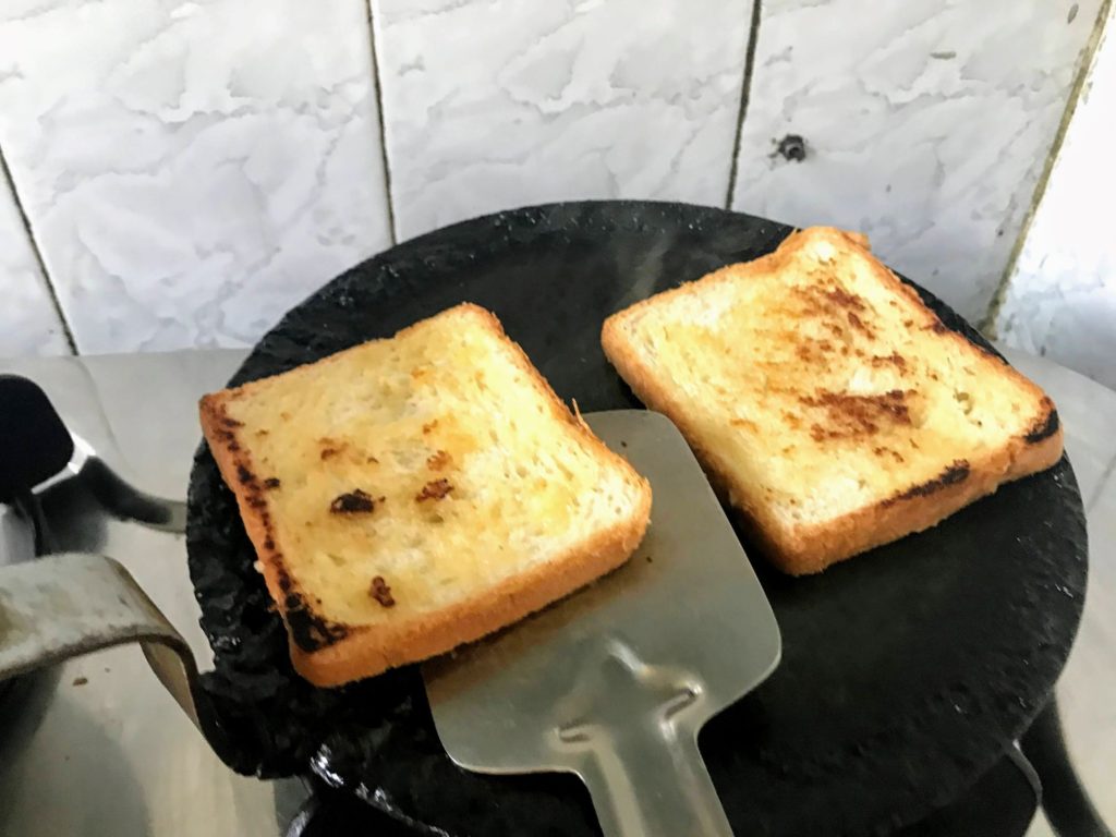 Toasting bread.