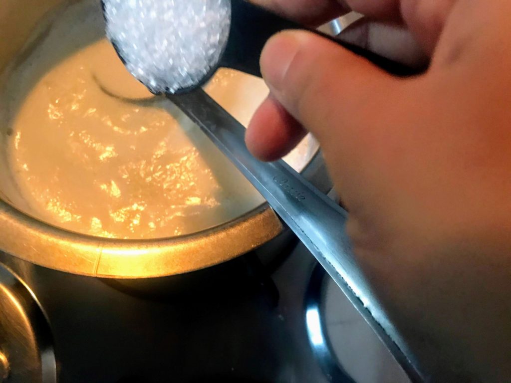 Adding sugar to milk