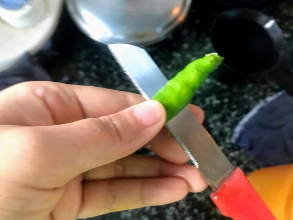 Slitting green chilli