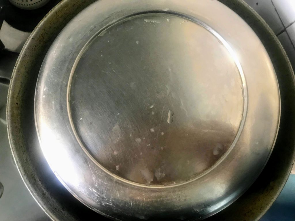 Tiffin box inside a pan