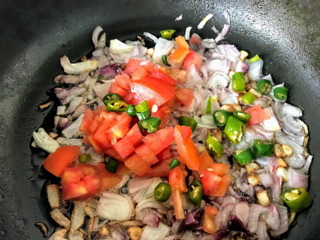 Tomato with green chillies