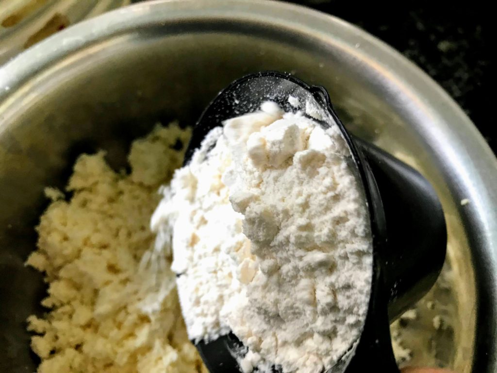 Adding maida in paneer