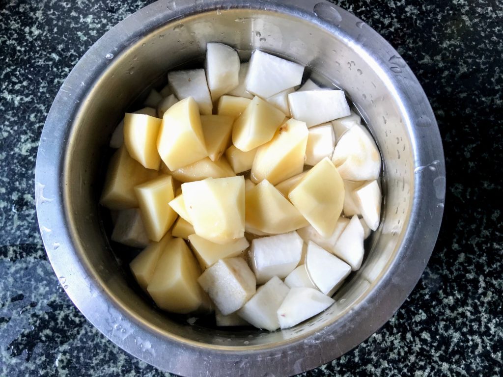 Diced potato and turnip soaked in water