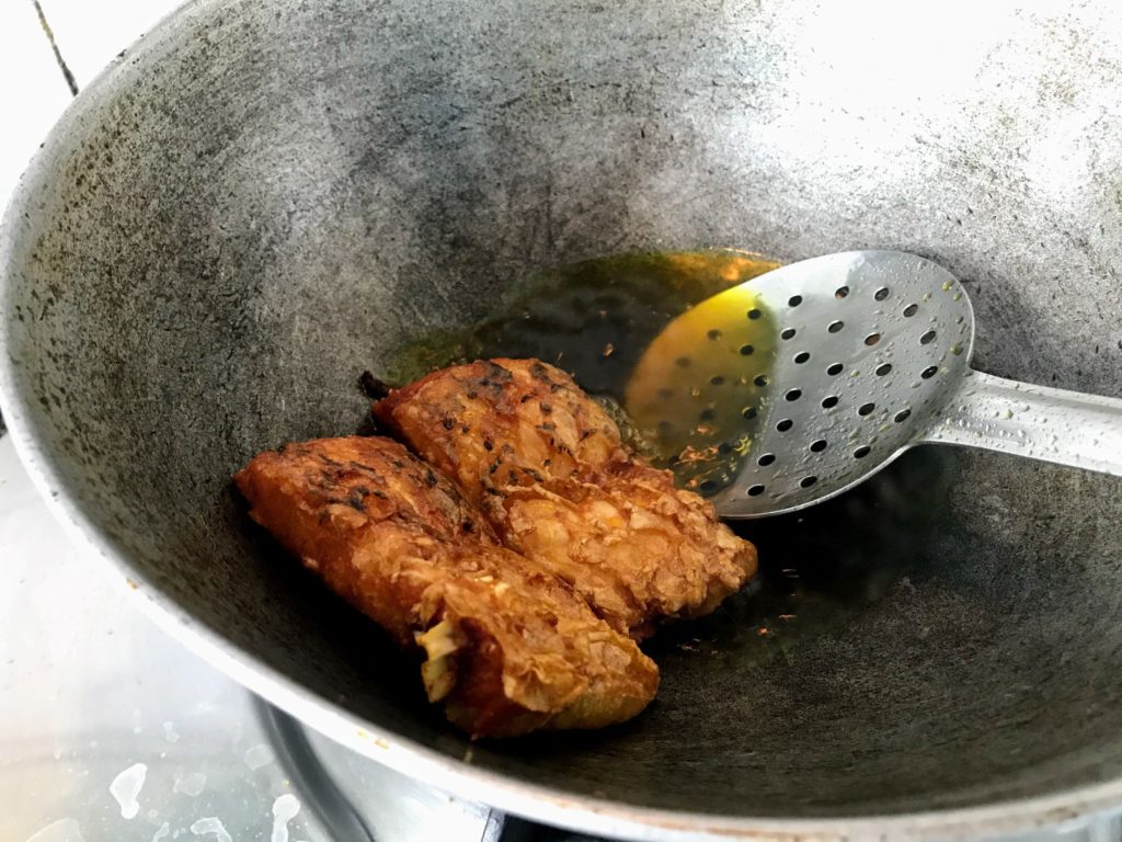 Frying fish pieces