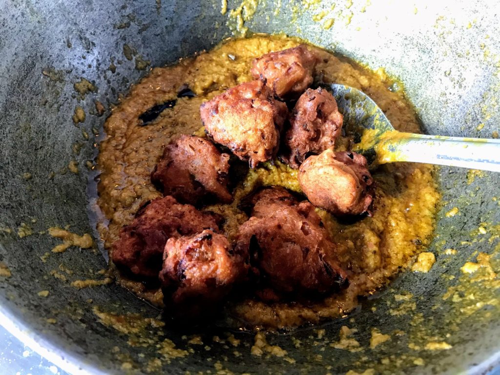 Preparing Macher Dimer Kofta Curry