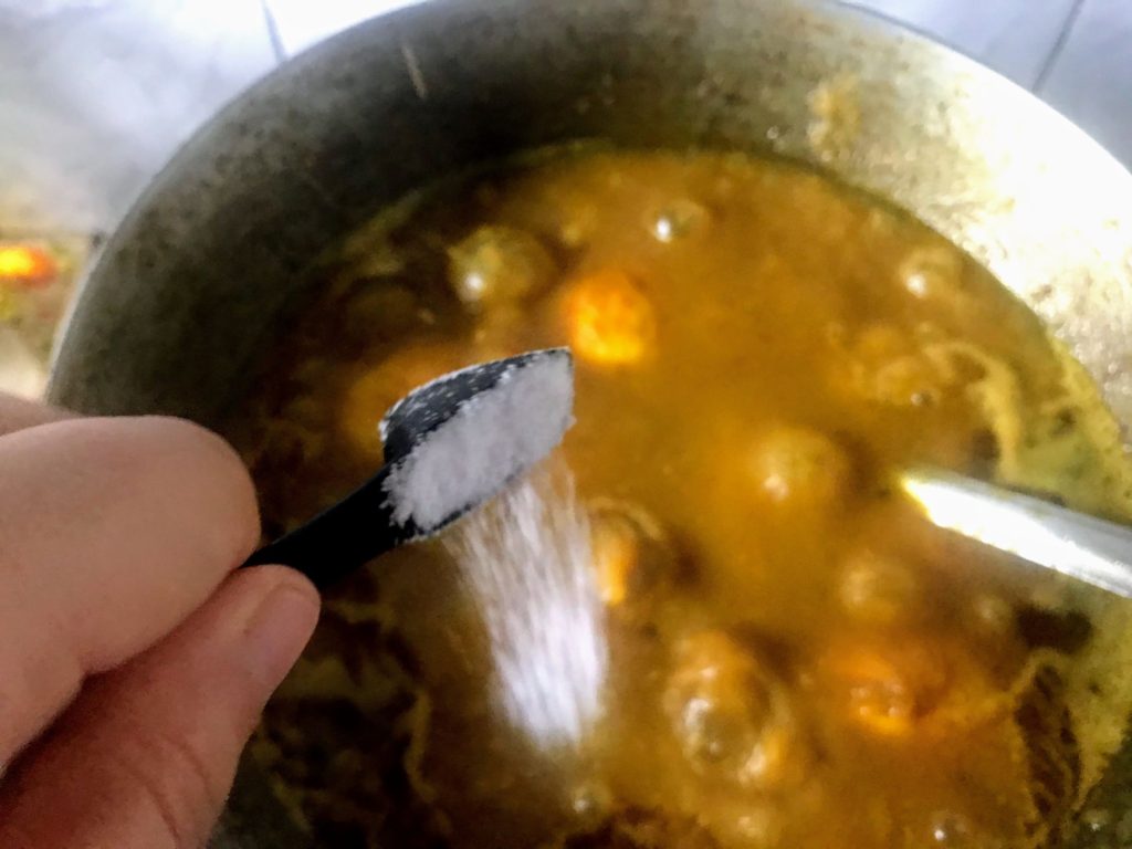 Adding salt to a curry