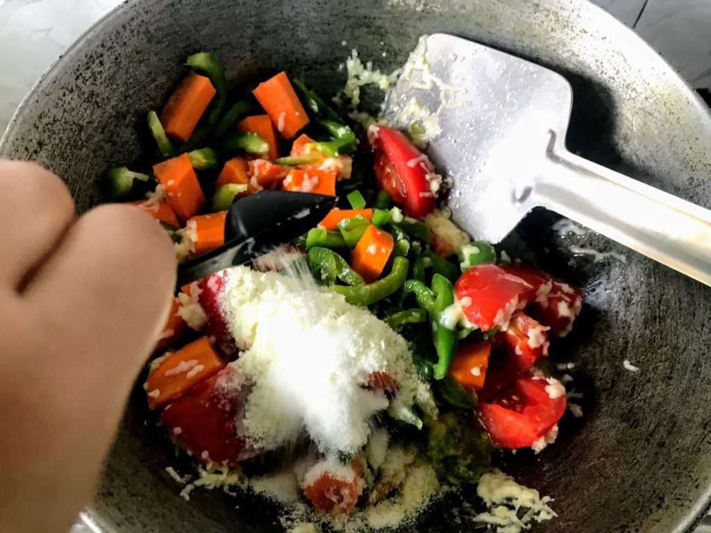 Cooking vegetables with cheese