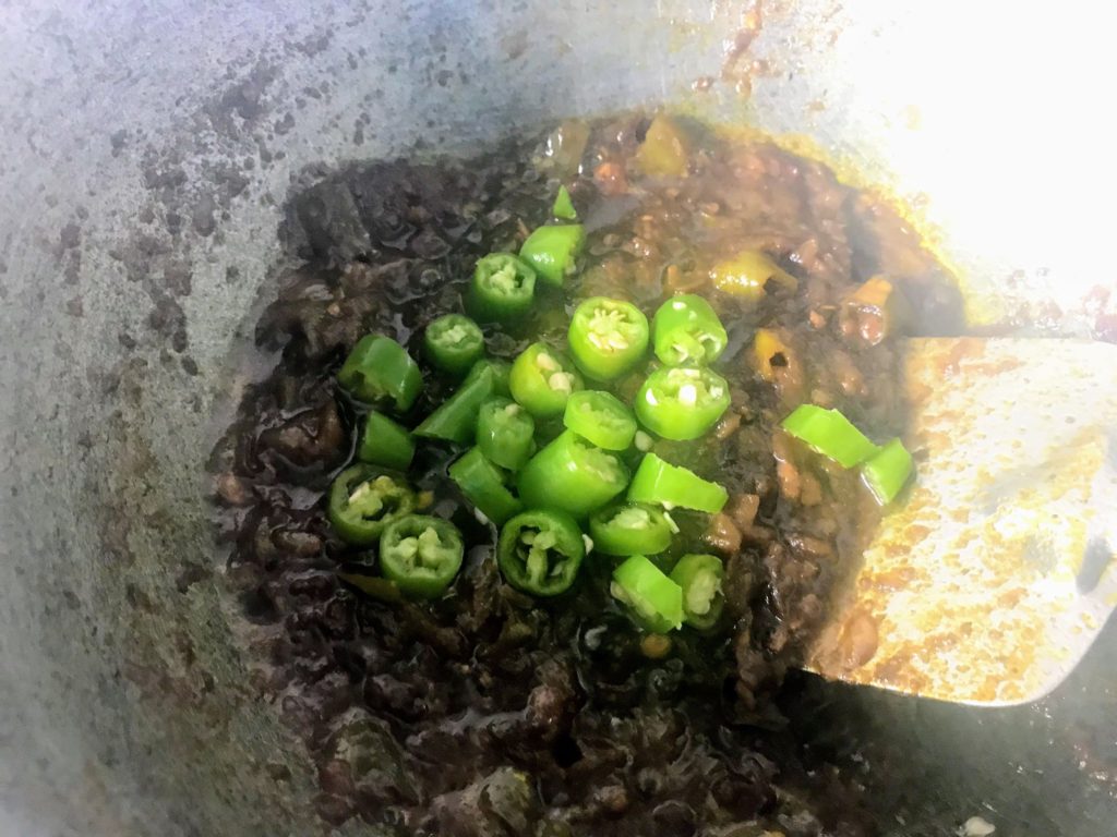 Adding chilli to chutney