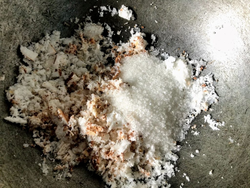 Grated coconut and sugar