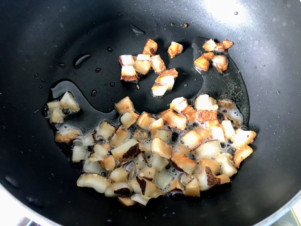 Frying coconut pieces