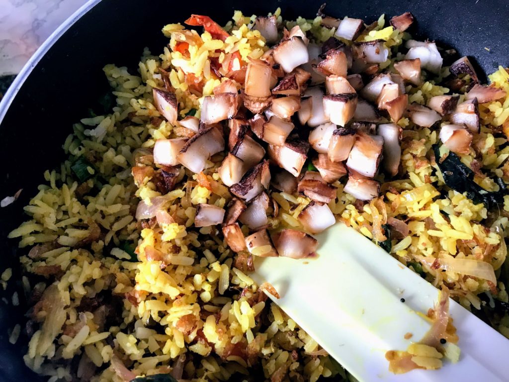 Coconut chunks on poha