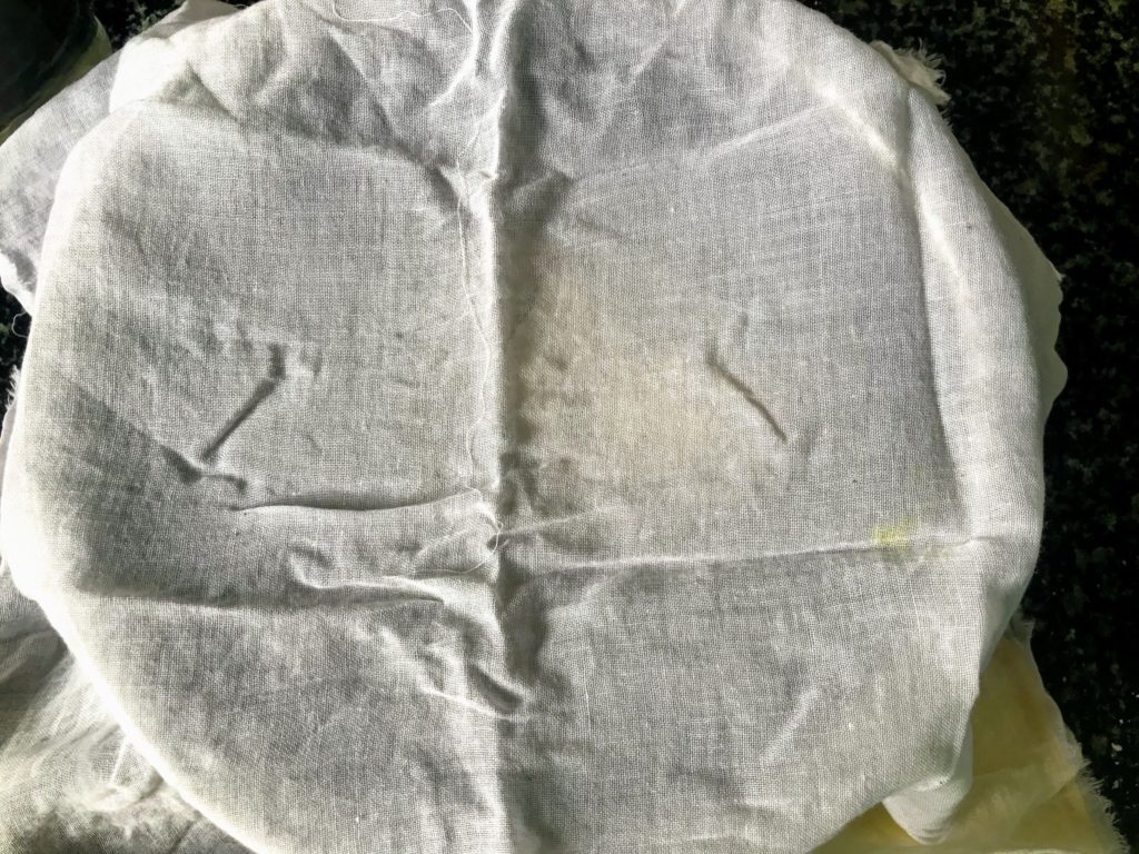 Dough covered with muslin cloth