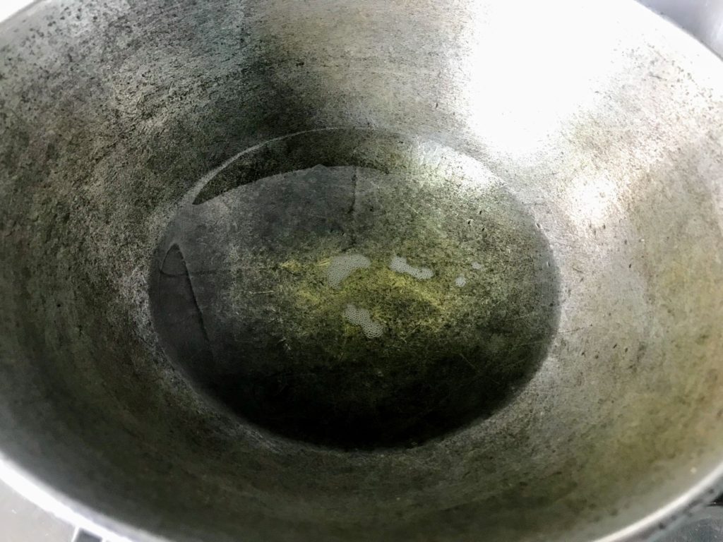 Heating oil in a wok