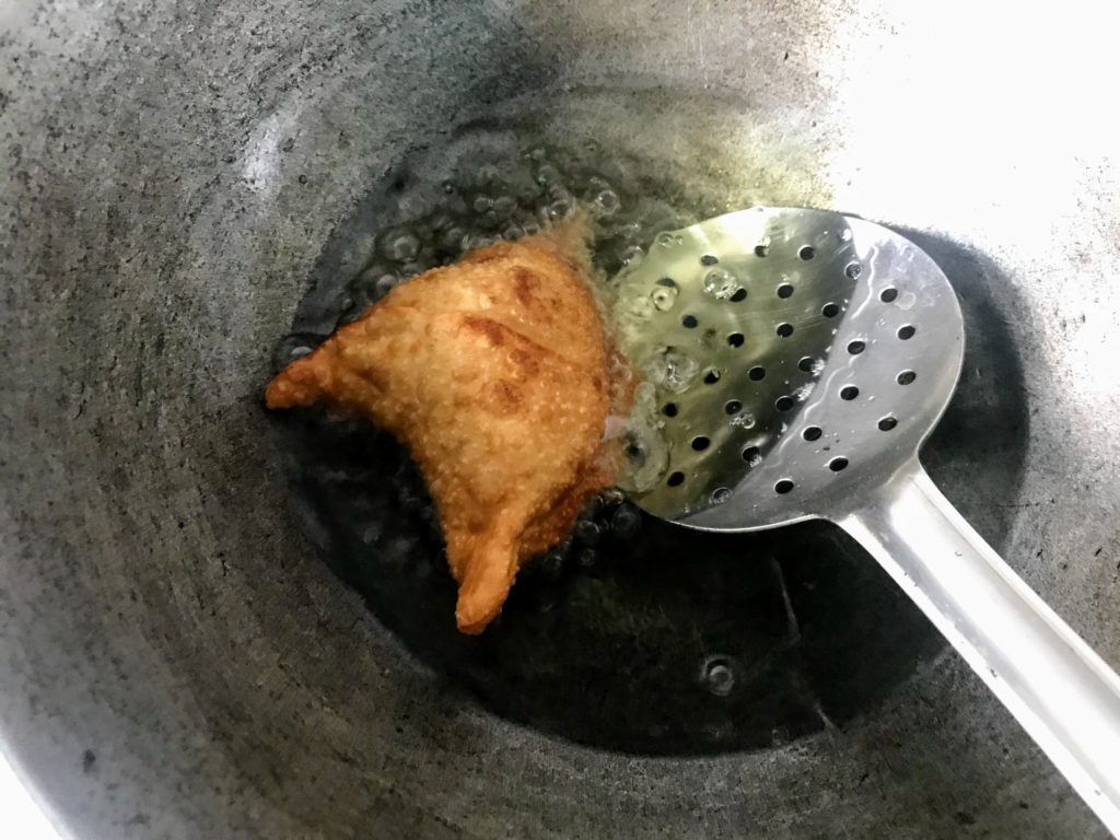 Frying samosa