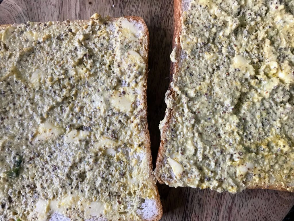 Mustard paste and butter on bread