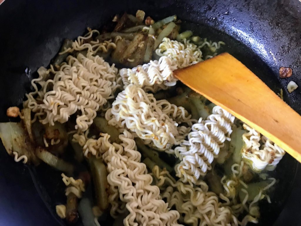 Adding water to noodles