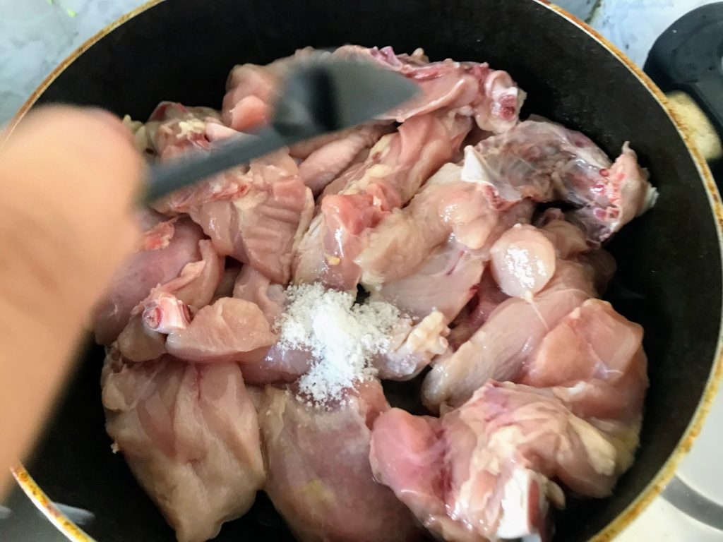 Adding salt to chicken