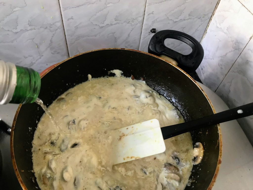 Adding white wine to cream